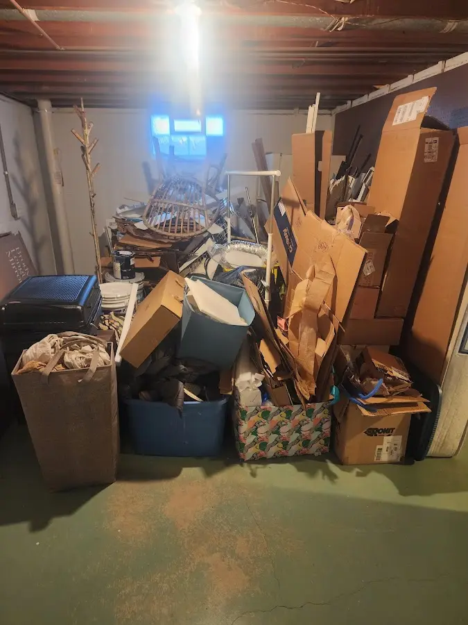 Roll-off dumpster container at job site for Concrete Dumpster Rental in Maquoketa